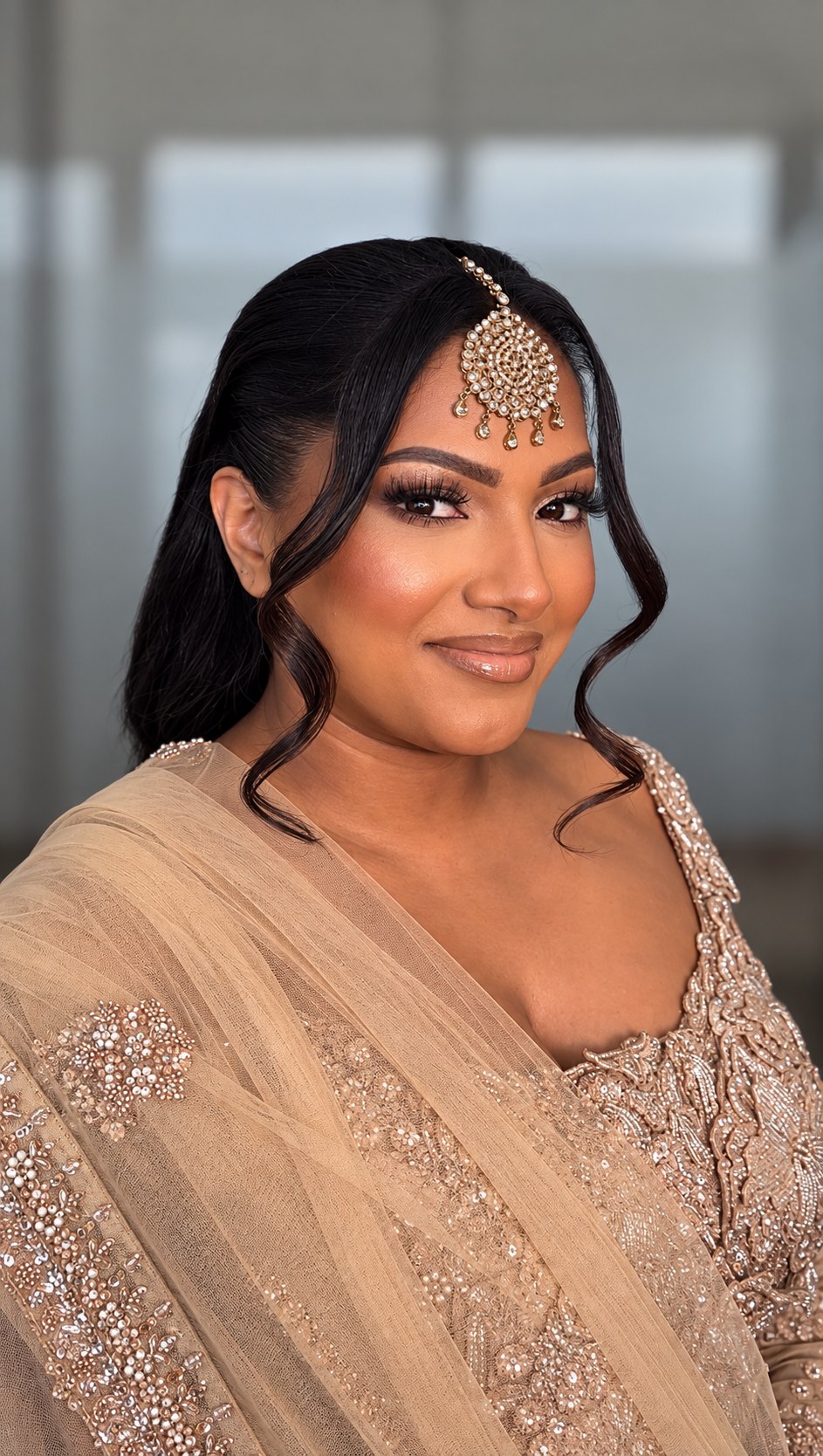 Golden occasion makeup and polished hairstyling by RAUNAQ